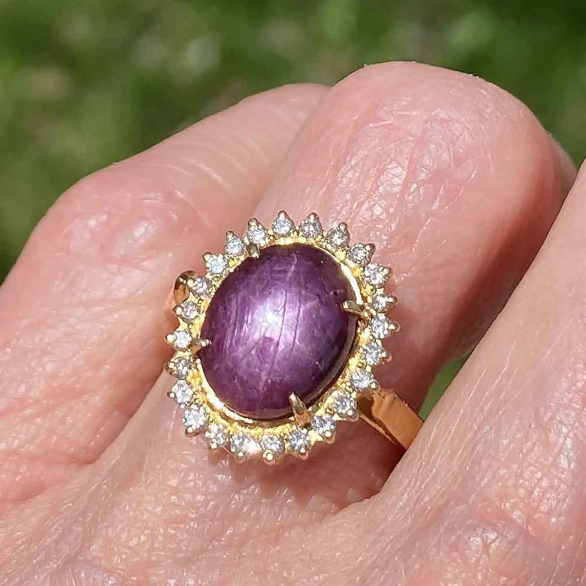 Ruby Star Sapphire Diamond Halo Ring in 18K Gold