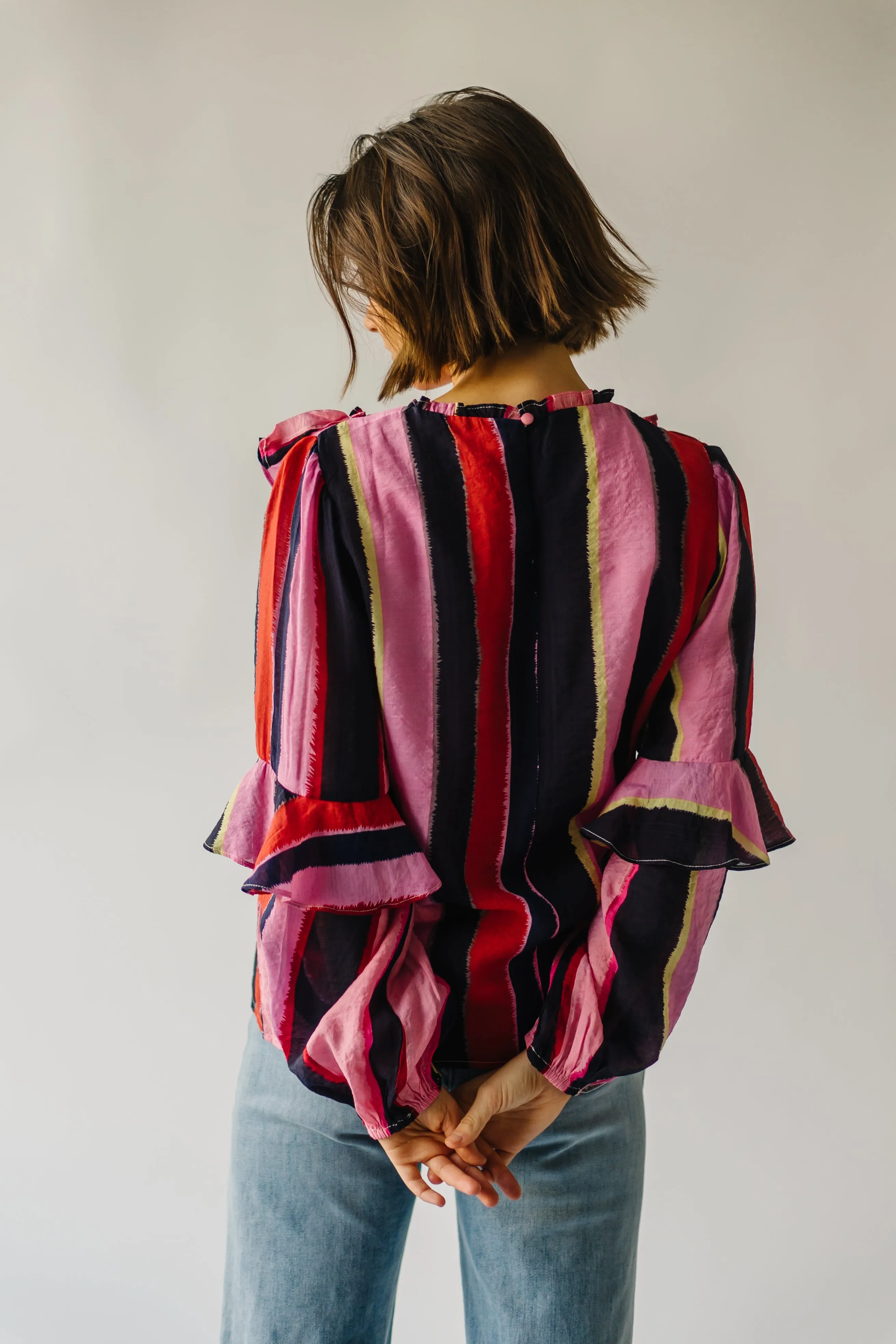 The Belterra Ruffle Detail Blouse in Pink Stripe